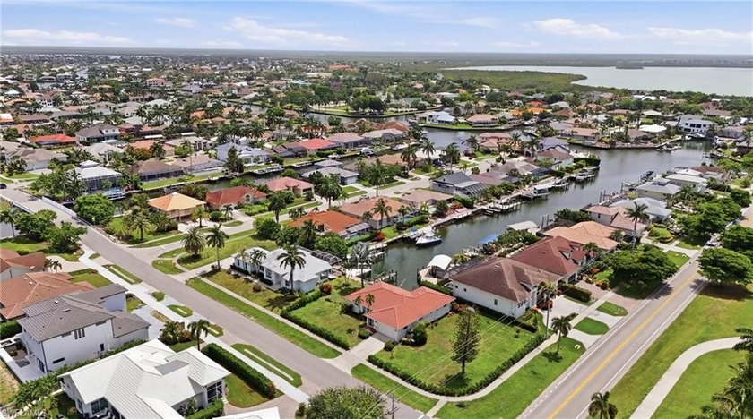 Enjoy coveted southern exposure and quick boating access to the - photo 41