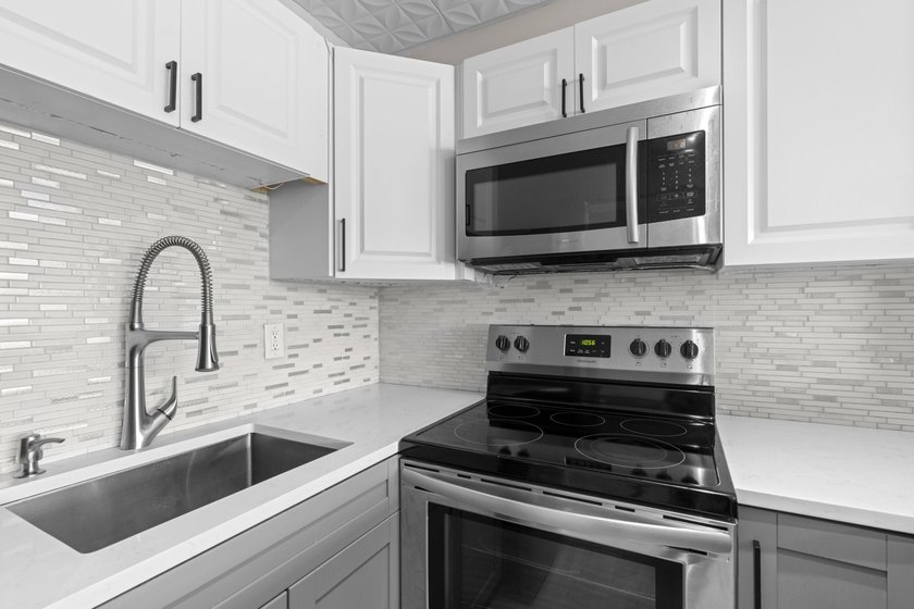 Rarely available and beautifully renovated from top to bottom - photo 2