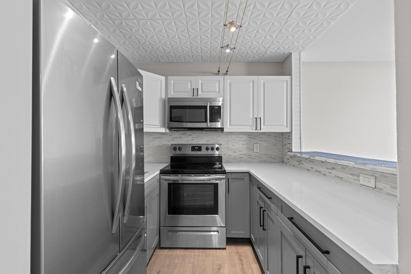 Rarely available and beautifully renovated from top to bottom - photo 3