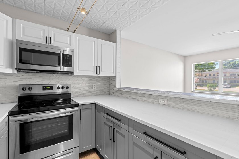 Rarely available and beautifully renovated from top to bottom - photo 4