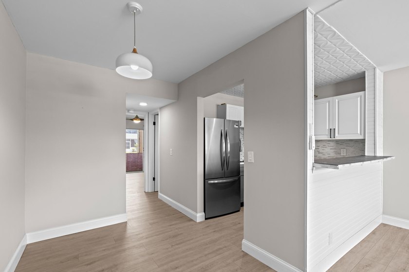 Rarely available and beautifully renovated from top to bottom - photo 7