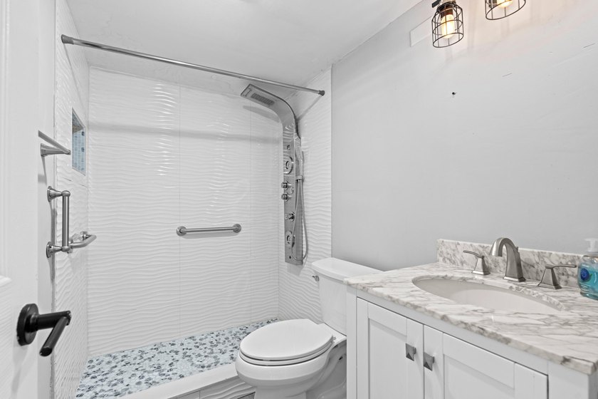 Rarely available and beautifully renovated from top to bottom - photo 10