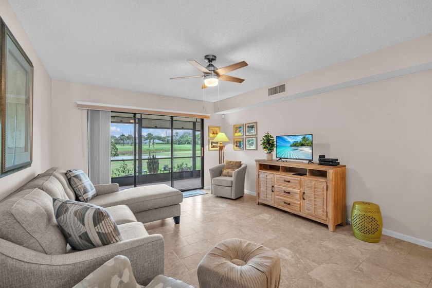 A charming and impeccably maintained two-bedroom, two-bathroom - photo 2