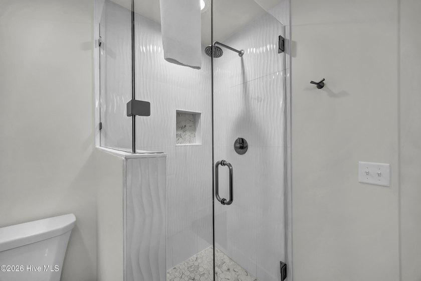 Discover newly renovated coastal elegance at 305 S Bald Head - photo 21