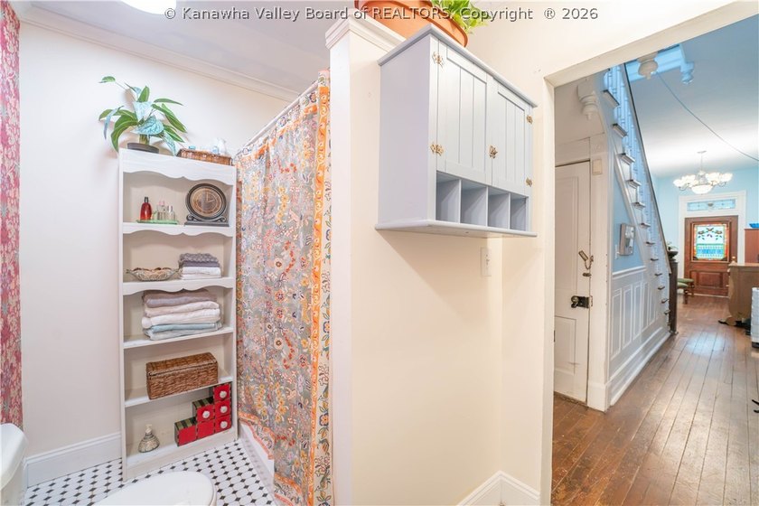 Step into timeless charm with this beautifully updated 1893 - photo 26