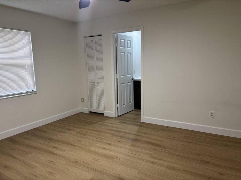 This 3-bedroom, 2-bath home features vaulted ceilings which - photo 5