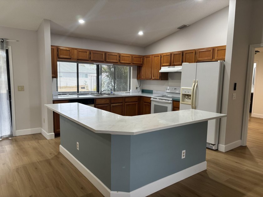 This 3-bedroom, 2-bath home features vaulted ceilings which - photo 8