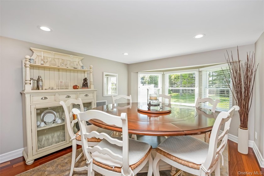 Welcome to this beautifully updated expanded Cape nestled in the - photo 14