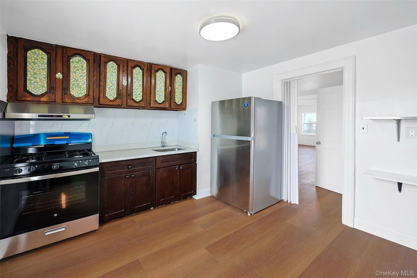 Welcome to this beautifully renovated detached 2-family home in - photo 14