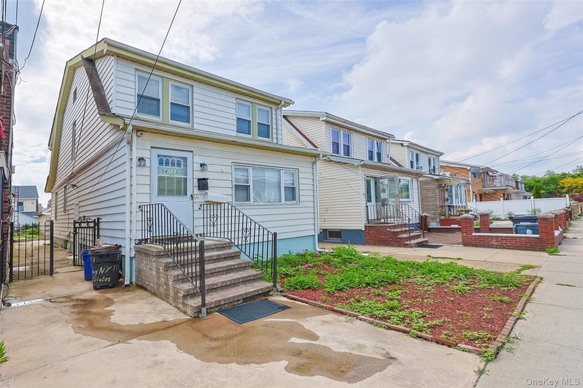 Welcome to this beautifully renovated detached 2-family home in - photo 18