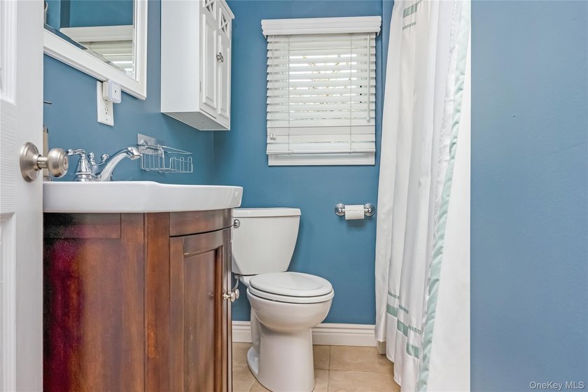 Welcome to this beautifully updated expanded Cape nestled in the - photo 24