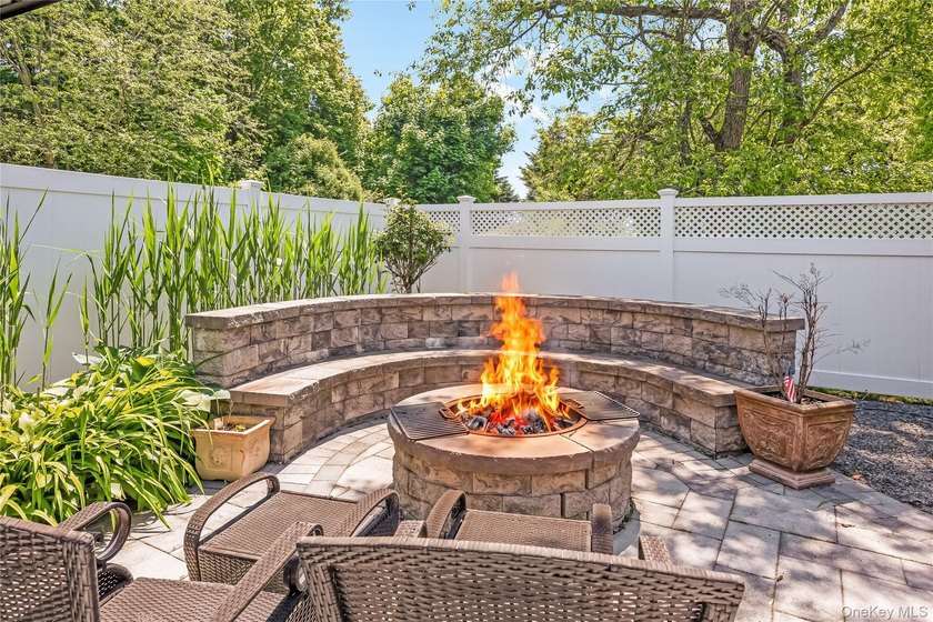 Welcome to this beautifully updated expanded Cape nestled in the - photo 32