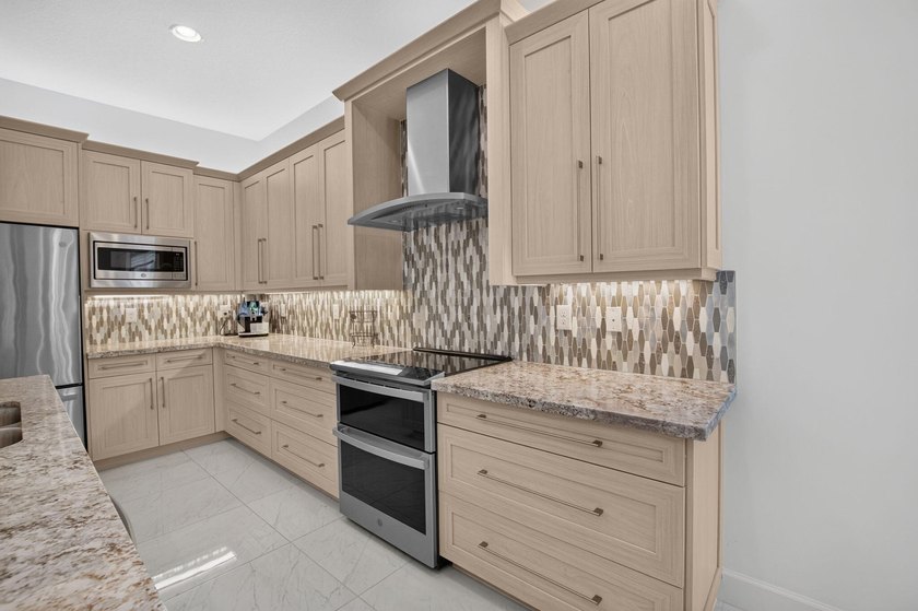 Impeccably upgraded 4-bedroom, 4-full-bath Geneva model in the - photo 9