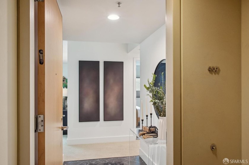 Quiet, spacious, and exceptionally convenient, Unit 407 is the - photo 9