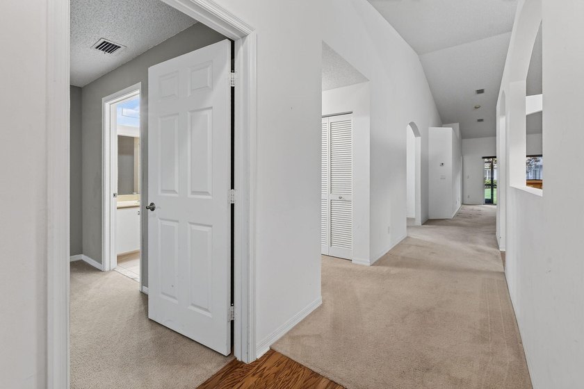 A MUST-See! This charming NEW 2025 ROOF and lakefront villa is - photo 10