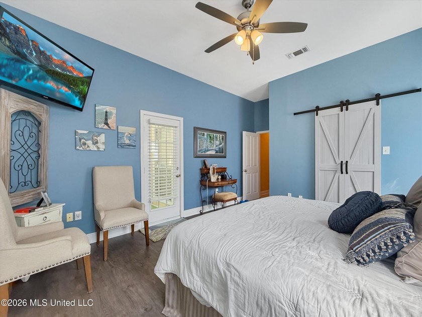 Welcome to this Riverfront gem on the Tchoutacabouffa! 3 Beds | - photo 11