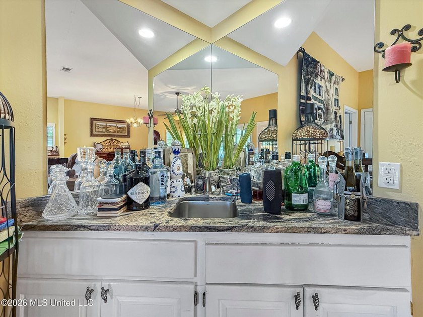 Welcome to this Riverfront gem on the Tchoutacabouffa! 3 Beds | - photo 19