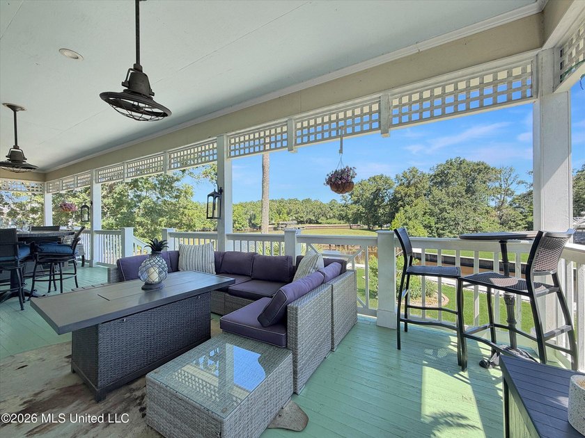 Welcome to this Riverfront gem on the Tchoutacabouffa! 3 Beds | - photo 23