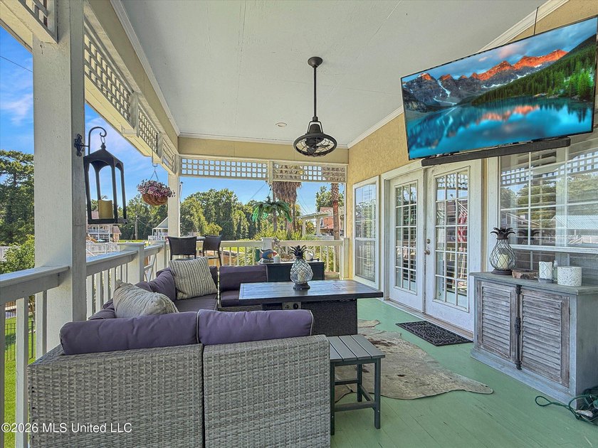 Welcome to this Riverfront gem on the Tchoutacabouffa! 3 Beds | - photo 24