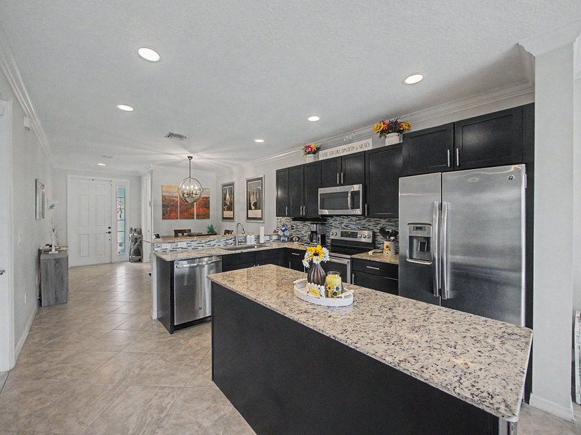 Experience elevated and tranquil waterfront living in this - photo 10