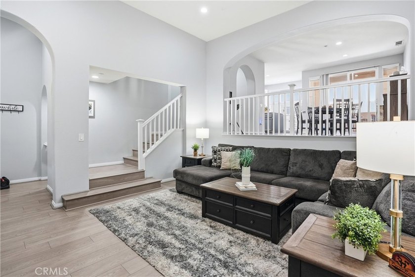 Welcome to this highly upgraded three-bedroom residence in the - photo 2