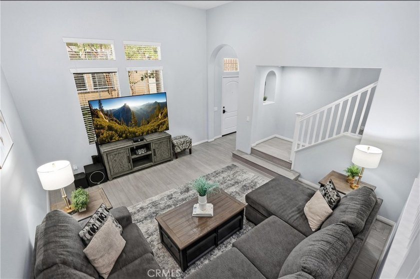 Welcome to this highly upgraded three-bedroom residence in the - photo 4