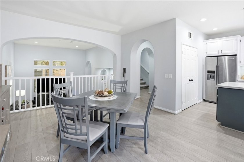 Welcome to this highly upgraded three-bedroom residence in the - photo 5
