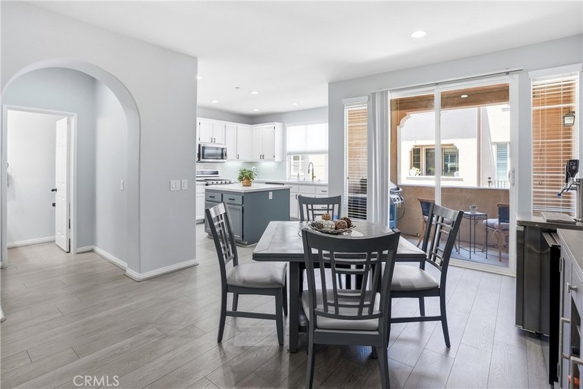 Welcome to this highly upgraded three-bedroom residence in the - photo 9