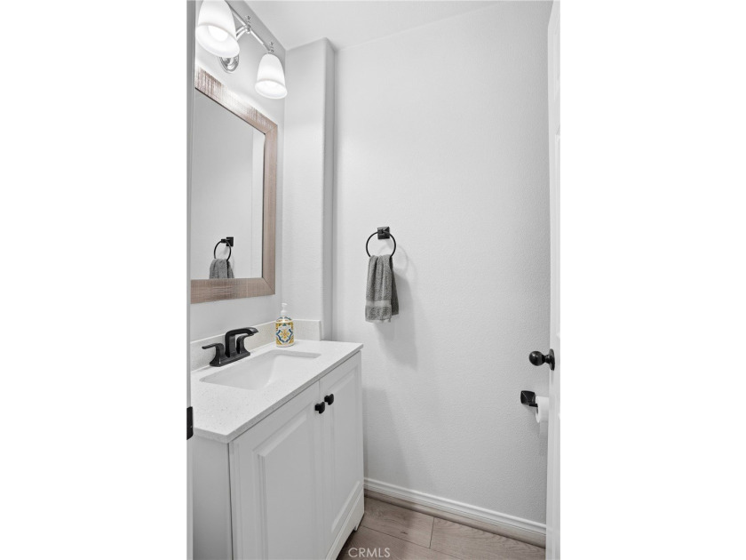 Welcome to this highly upgraded three-bedroom residence in the - photo 10