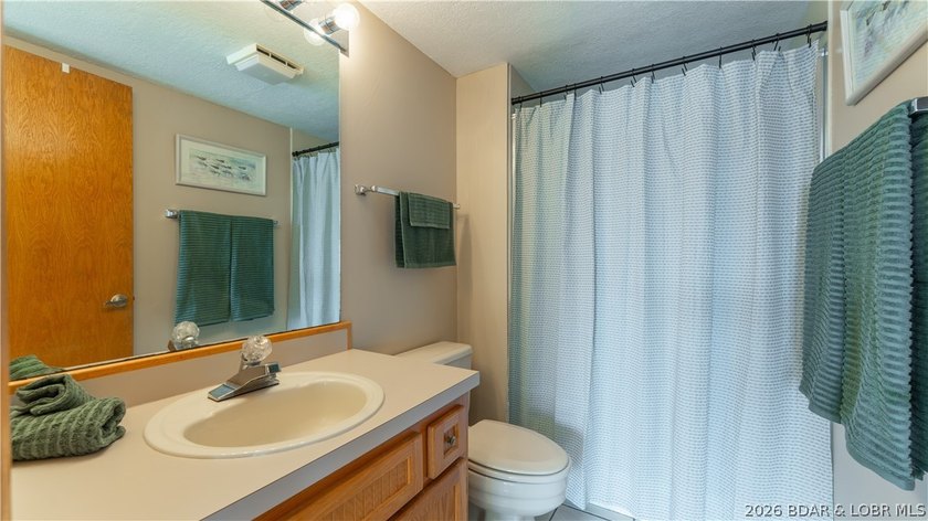 Cove location with sweeping main channel views makes this - photo 23