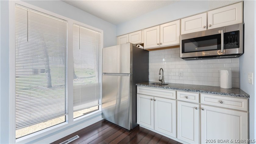 Cove location with sweeping main channel views makes this - photo 43