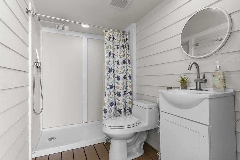 Coastal elegance just steps from the Gulf! 407 Petrel Ave blends - photo 49