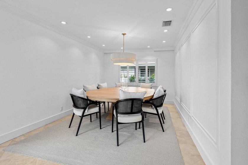 Welcome to this exceptional single-story waterfront residence in - photo 9
