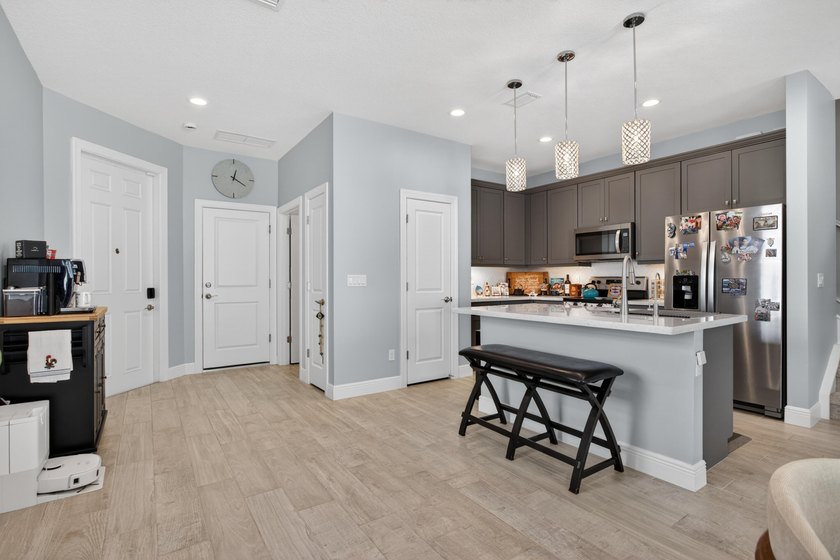 Beautifully upgraded 4BR / 2.5BA corner unit featuring an - photo 8