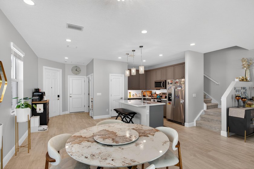 Beautifully upgraded 4BR / 2.5BA corner unit featuring an - photo 9