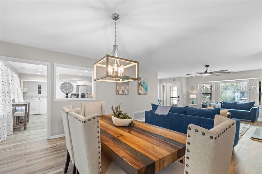 This beautifully updated residence offers laminate wood flooring - photo 13