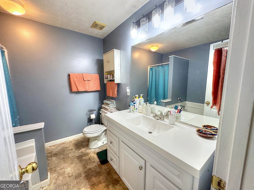 Welcome home to this charming 3-bedroom, 2-bath ranch nestled in - photo 15