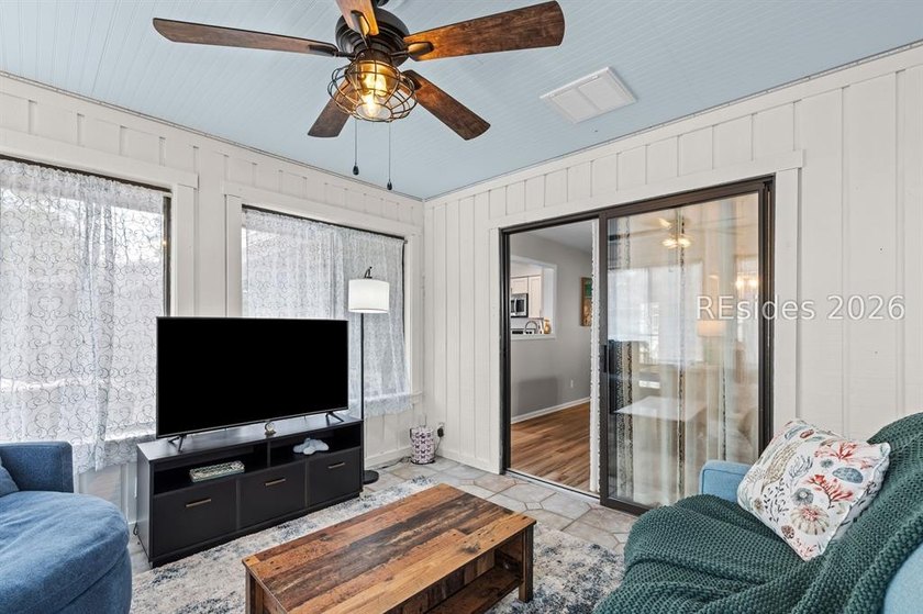 This beautifully updated residence offers laminate wood flooring - photo 15