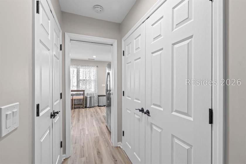 This beautifully updated residence offers laminate wood flooring - photo 21