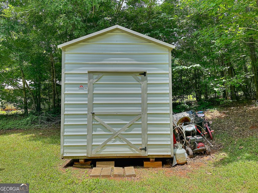 Welcome home to this charming 3-bedroom, 2-bath ranch nestled in - photo 23