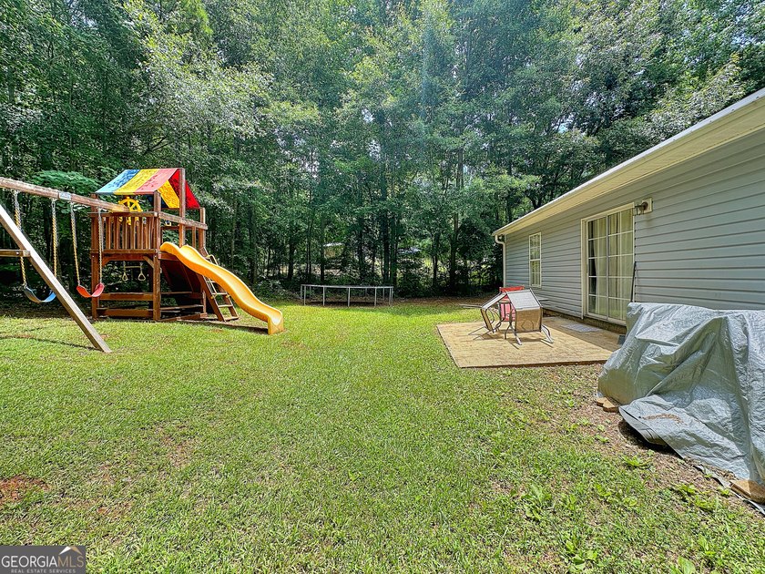 Welcome home to this charming 3-bedroom, 2-bath ranch nestled in - photo 24