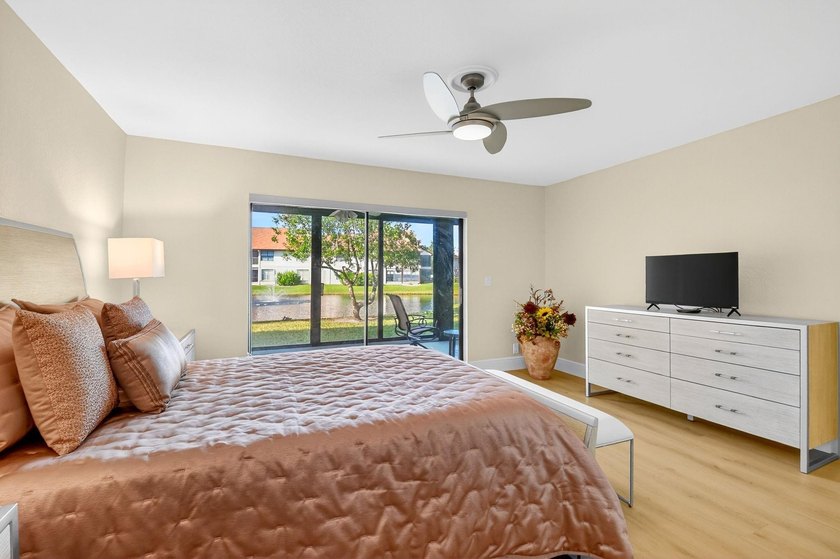 STUNNING LAKESIDE RENOVATION! 1st-floor condo offers expansive - photo 7
