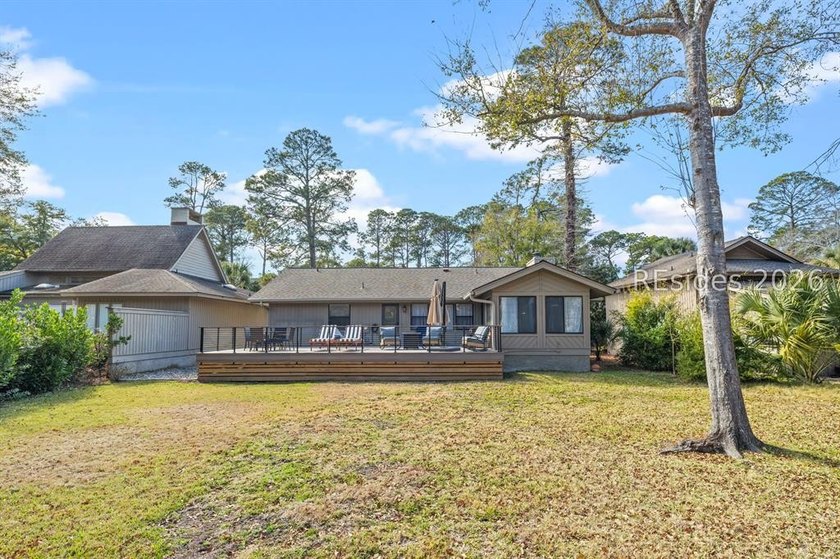 This beautifully updated residence offers laminate wood flooring - photo 35