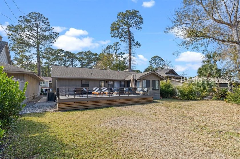 This beautifully updated residence offers laminate wood flooring - photo 36