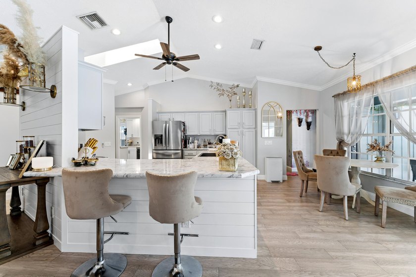 Welcome to this beautifully updated 4-bedroom, 3-bathroom home - photo 13