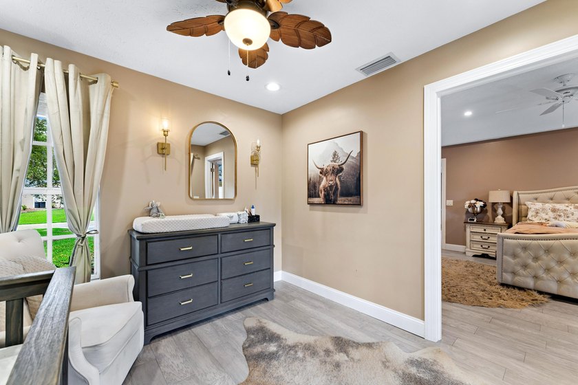 Welcome to this beautifully updated 4-bedroom, 3-bathroom home - photo 32