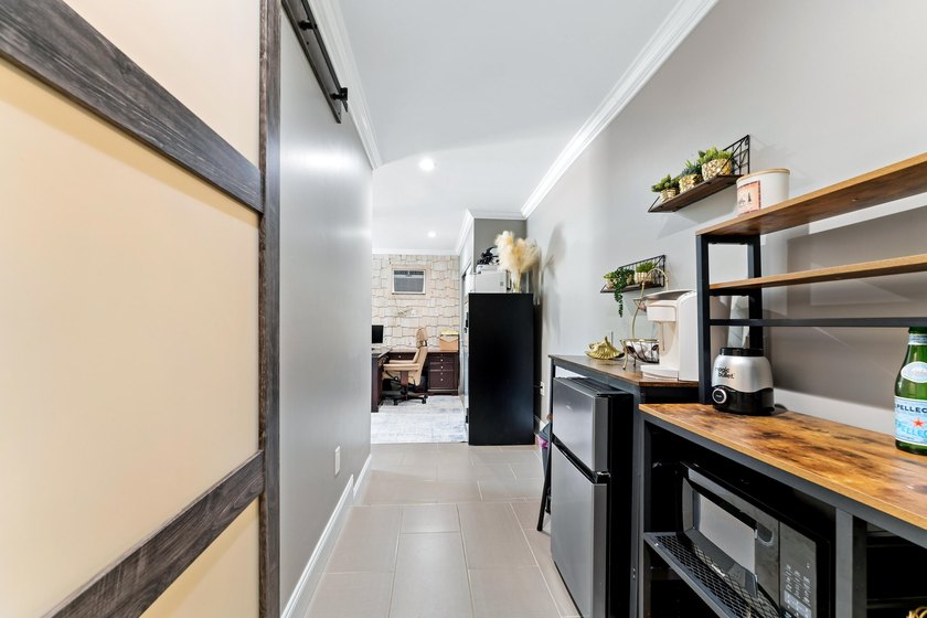 Welcome to this beautifully updated 4-bedroom, 3-bathroom home - photo 47