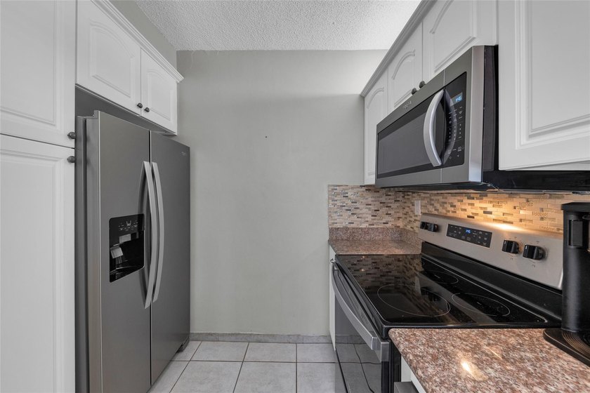 South Florida living at its best! Enjoy this exquisite location - photo 12