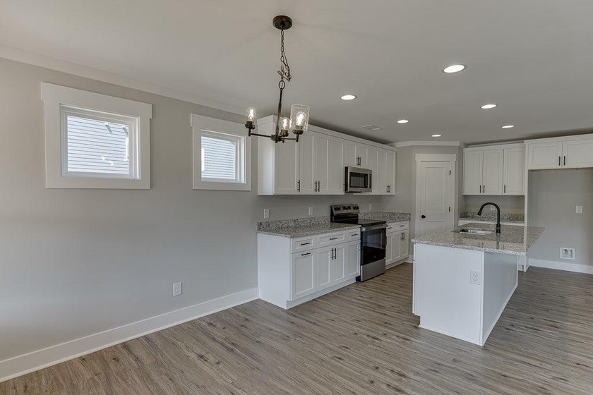 BEST VALUE IN THE COMMUNITY &amp; BEAUTIFUL FLAT 1 ACRE LOT! - photo 22
