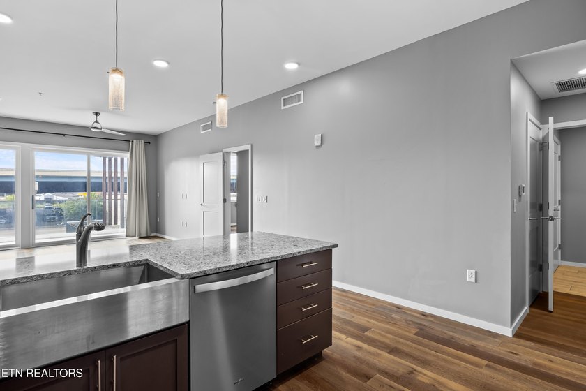 Live in the heart of downtown Knoxville at Regas Square! This - photo 5
